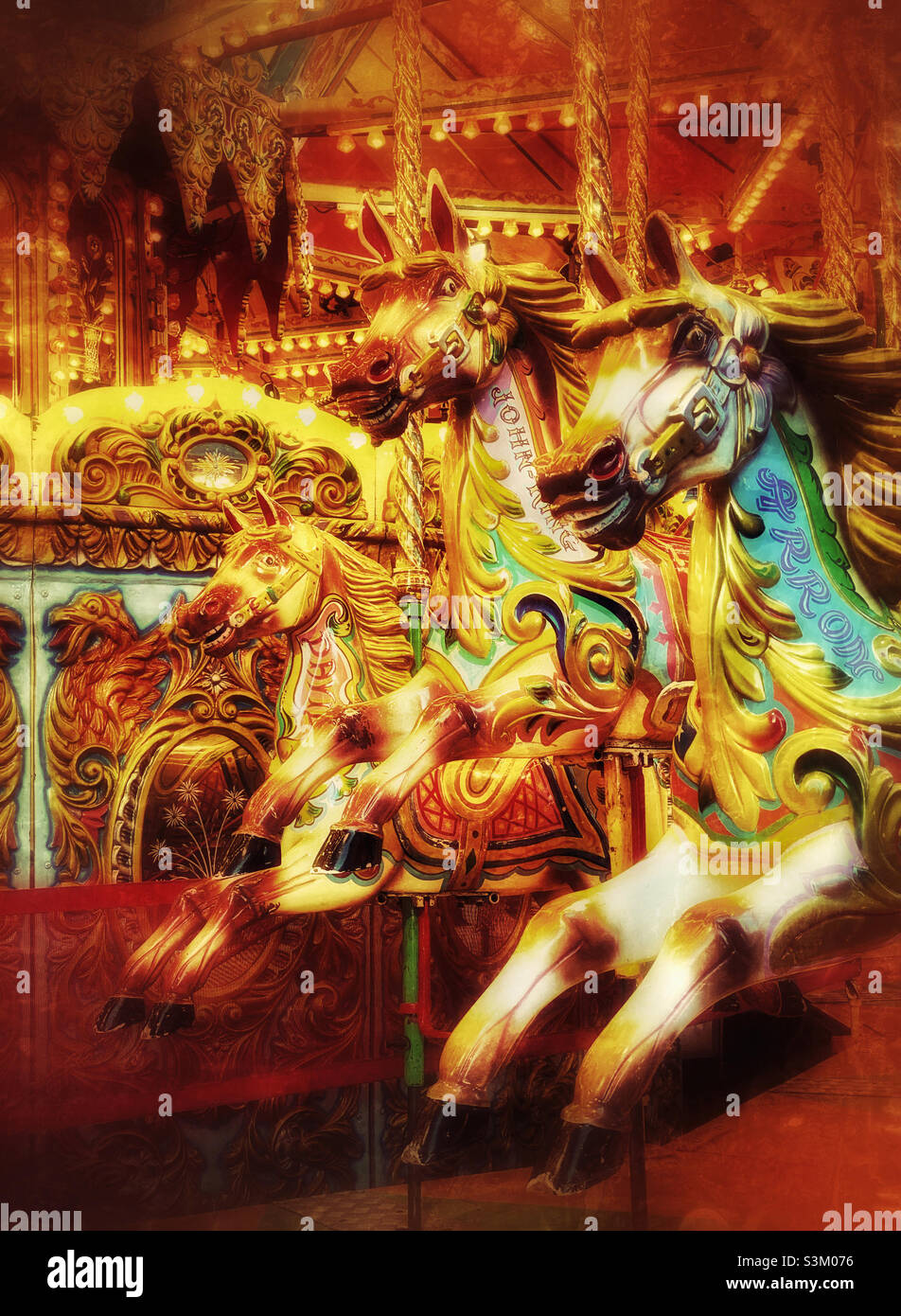 Three horses await the start of the next fun fair ride. An ideal opportunity to give some children & parents some holiday fun & entertainment. All the fun of the carousel! Photo ©️ COLIN HOSKINS. - Smartphone Captured Stock Image