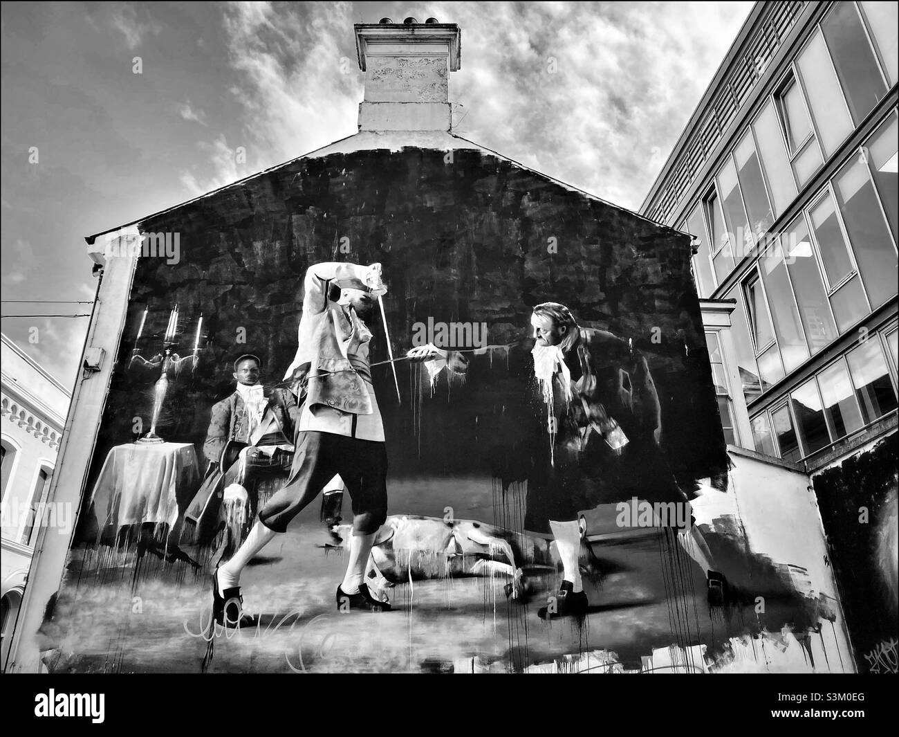 “The Duel of Belfast. Dance by Candlelight.” The famous and iconic artwork created by Conor Harrington & painted on the side of a building in Hill Street, Belfast, N. Ireland. Photo ©️ COLIN HOSKINS. - Smartphone Captured Stock Image