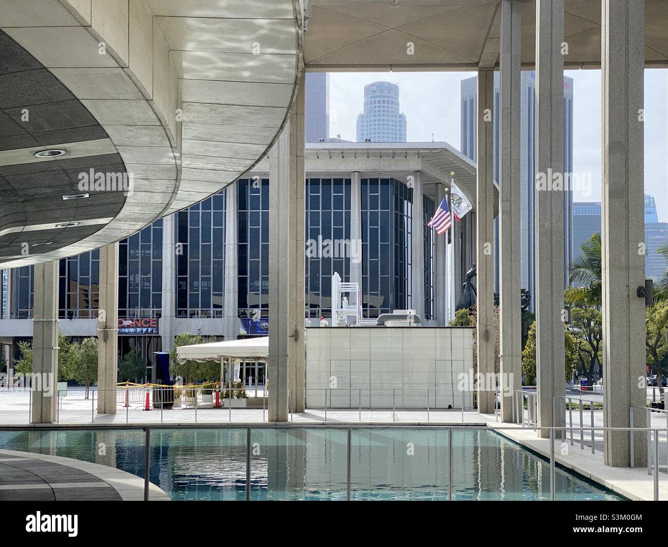 LOS ANGELES, CA, FEB 2021: Dorothy Chandler Pavilion, home of the LA Opera, seen from water feature outside the Mark Taper Forum at the Music Center in Downtown Stock Photo