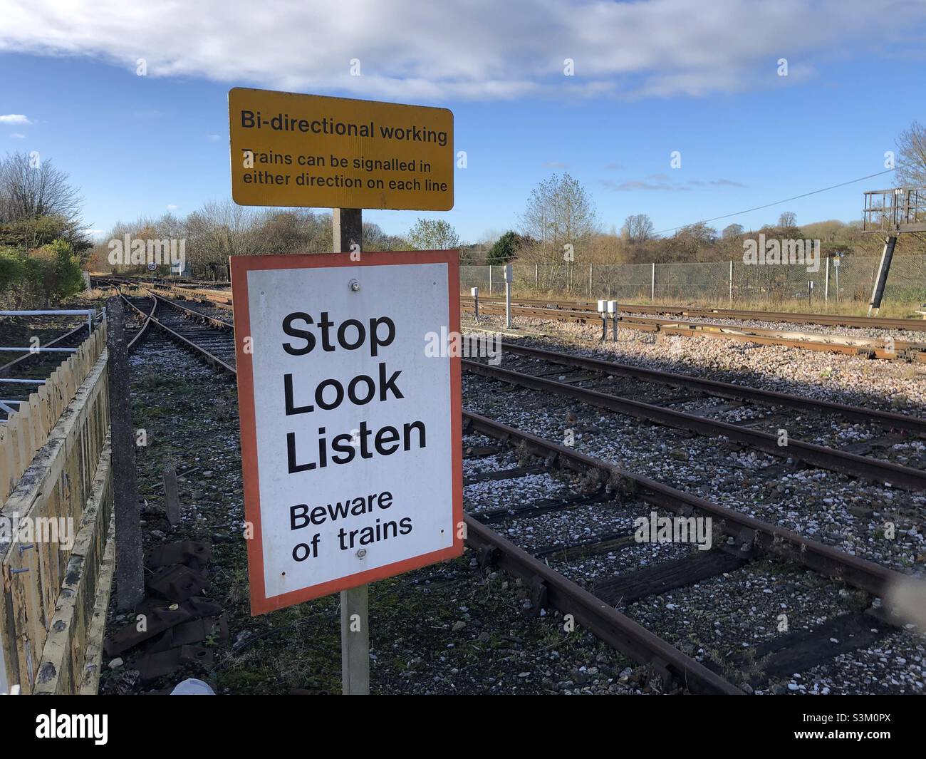 Railway safety sign on track crossing Stock Photo Alamy