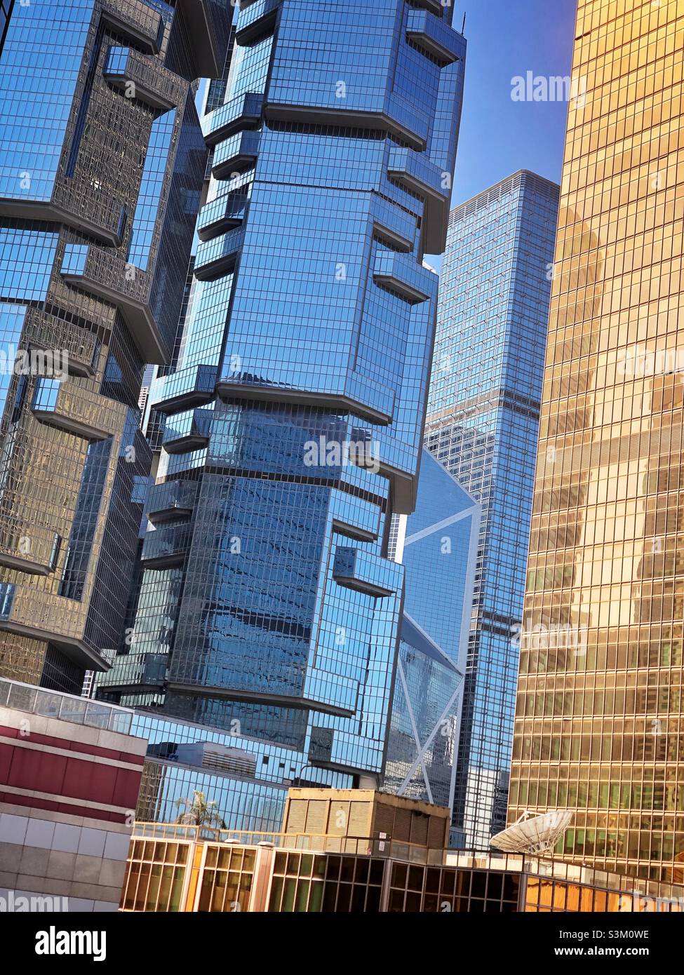 High-rise buildings in Admiralty, Hong Kong Island: (l to r) Lippo Centre, Bank of China Tower, Cheung Kong Center, Far East Finance Centre - Smartphone Captured Stock Image High-rise buildings in Admiralty, Hong Kong Island: (l to r) Lippo Centre, Bank of China Tower, Cheung Kong Center, Far East Finance Centre - Smartphone Captured Stock Image