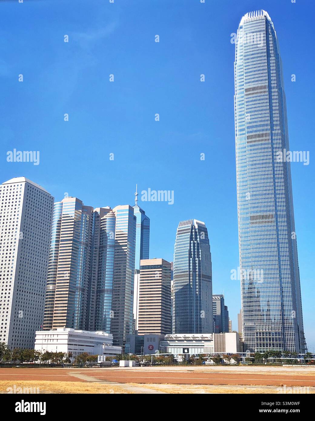 High-rise buildings in Central, Hong Kong Island: (l to r) Jardine House, 1 and 2 Exchange Square, The Center, 3 Exchange Square, 1ifc, 2ifc; (foreground) HK General Post Office, ifc Mall - Smartphone Captured Stock Image
