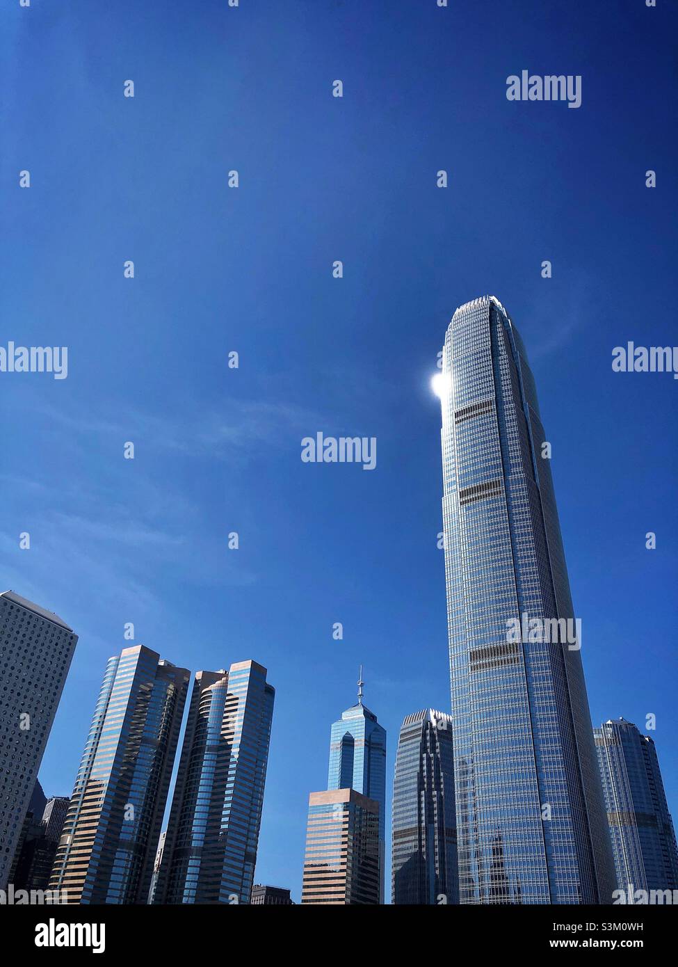 High-rise buildings in Central, Hong Kong Island: (l to r) Jardine House, Exchange Square, The Center, 1ifc, 2ifc, Four Seasons - Smartphone Captured Stock Image
