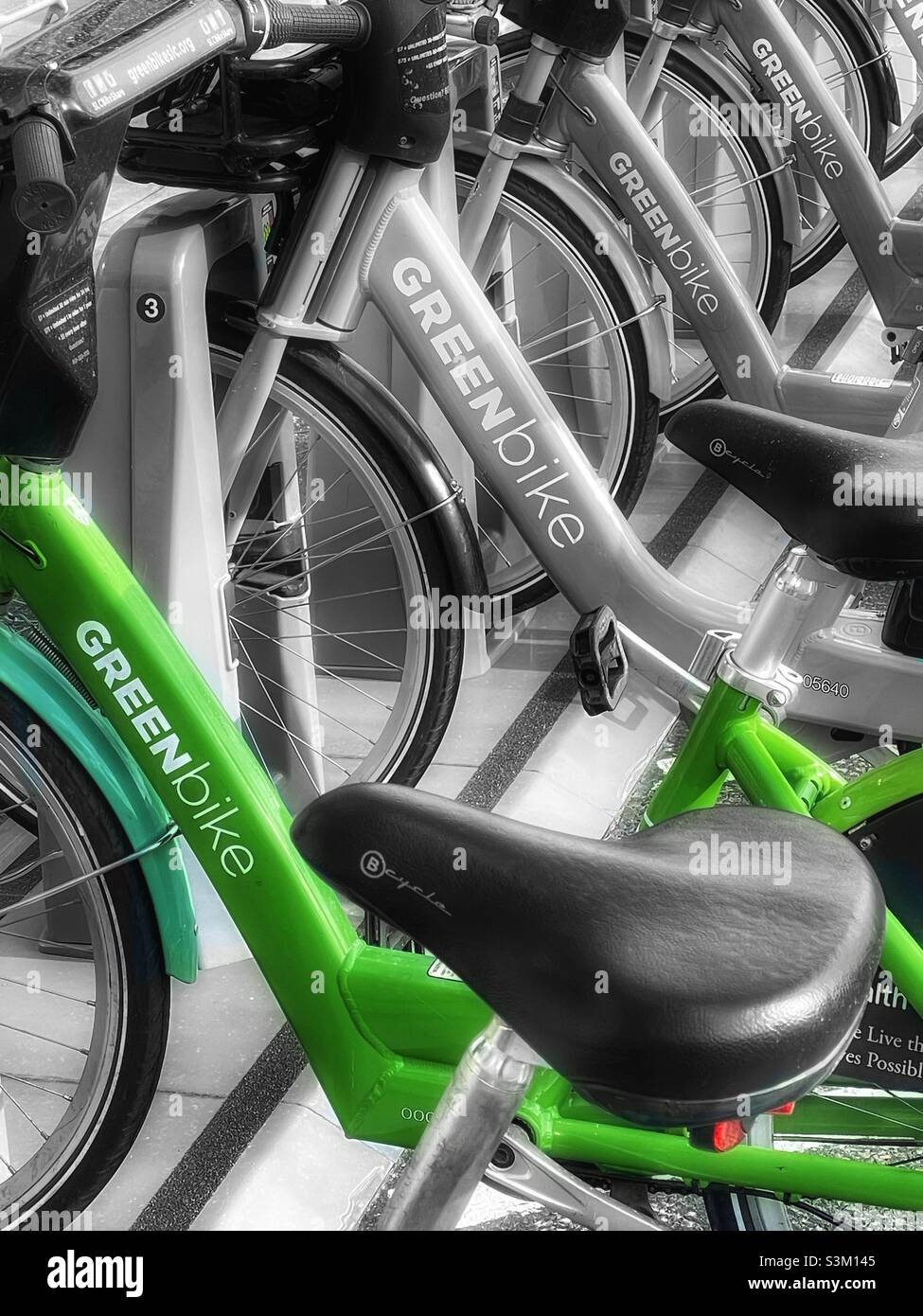 Greenbikes for rent near a shopping complex, Trolley Square, in Salt Lake City, Utah, USA. Sponsored by a local healthcare provider, these bikes are good for your health and the environment. - Smartphone Captured Stock Image