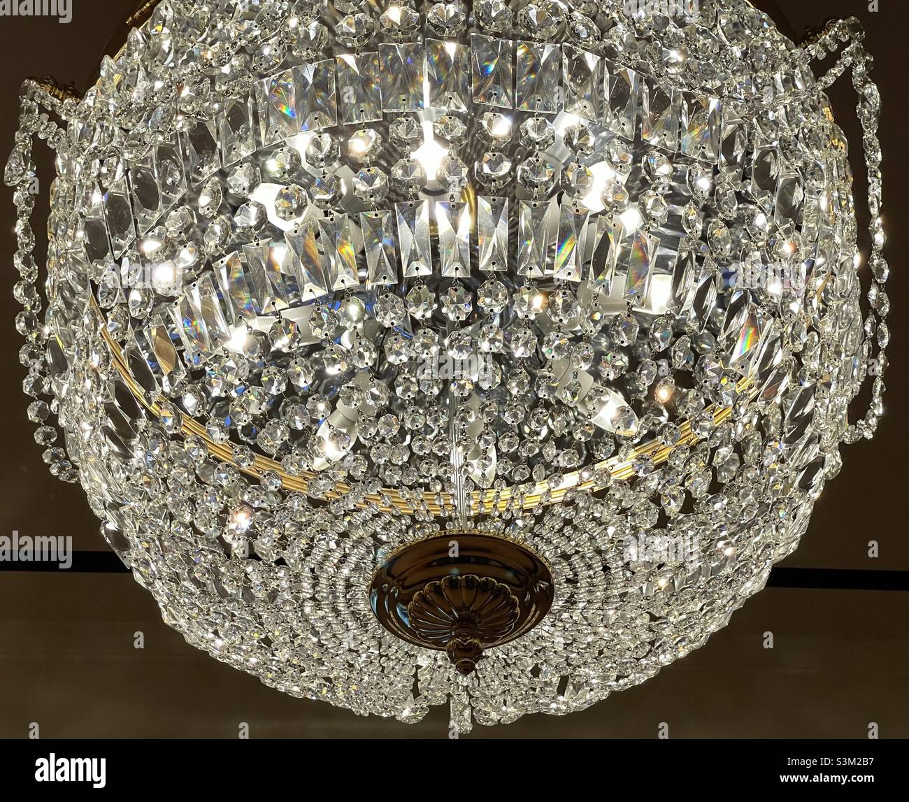A crystal chandelier hanging inside the Grand America hotel in Salt Lake City, Utah, USA. Stock Photo
