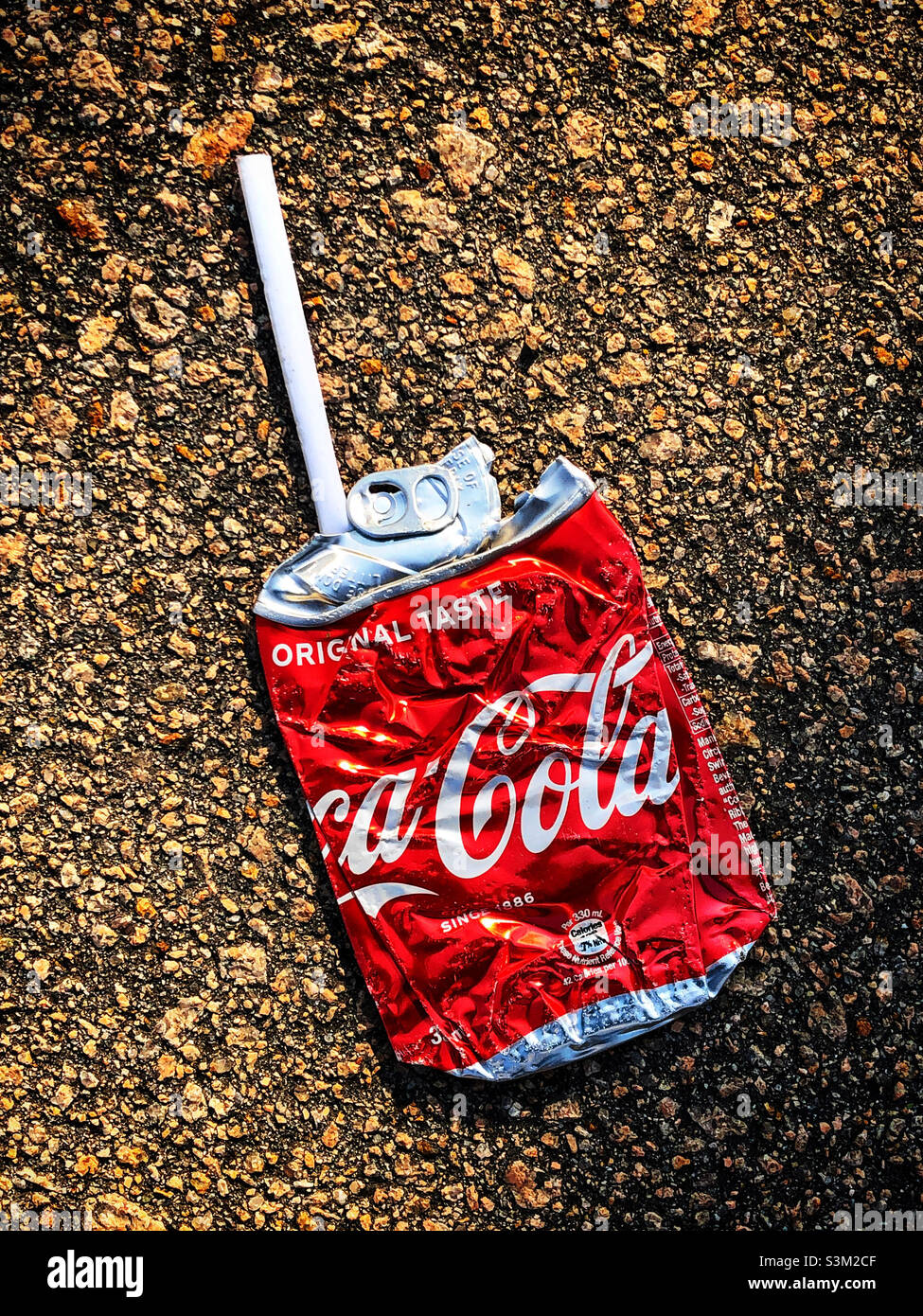Crushed Coke can, Hong Kong Stock Photo