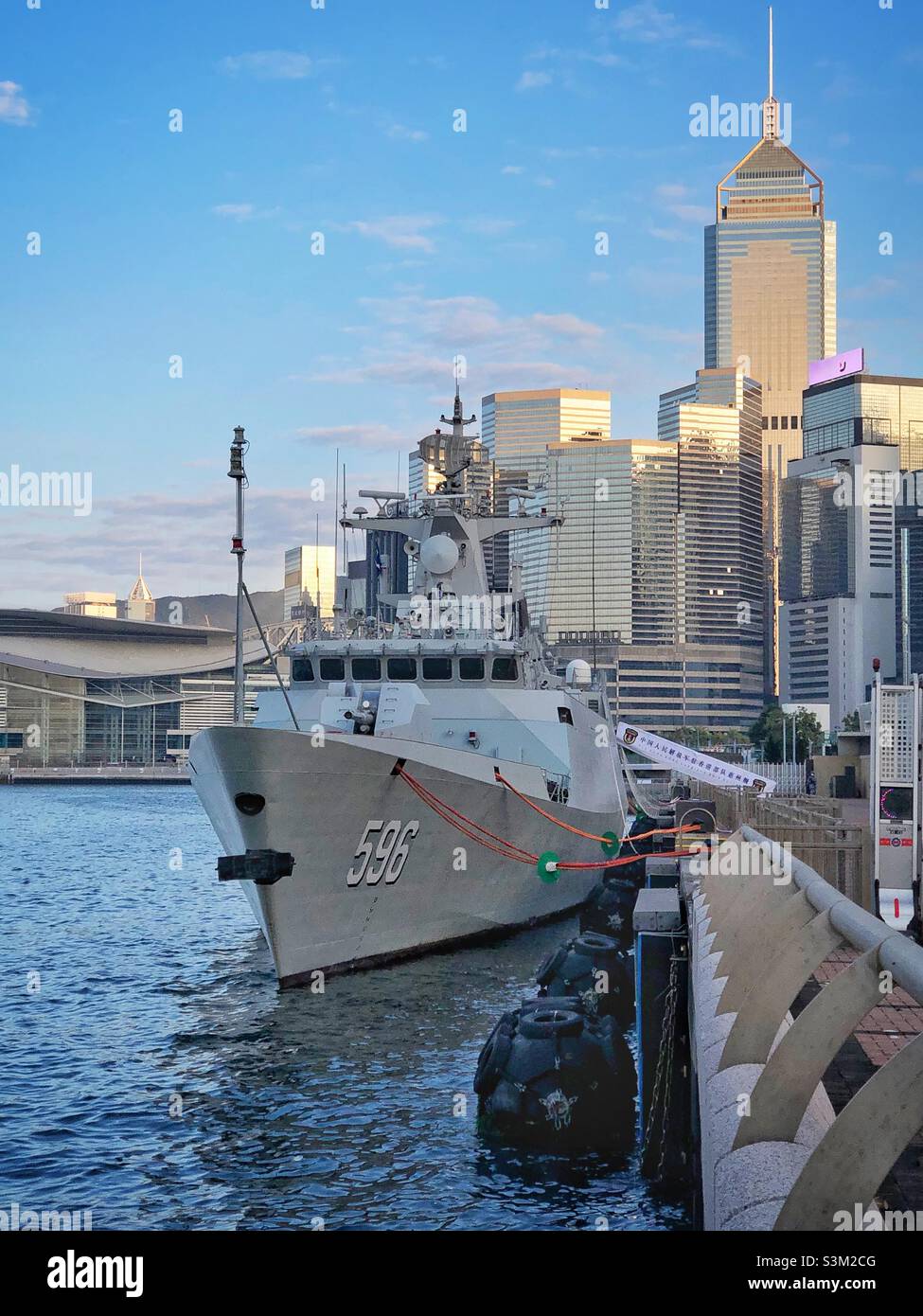 Jiangdao Class (Type 056) stealth corvette 'Huizhou' moored in Victoria Harbour, near the People's Liberation Army Garrison to which it is attached, Admiralty, Hong Kong Island, February 2021 - Smartphone Captured Stock Image