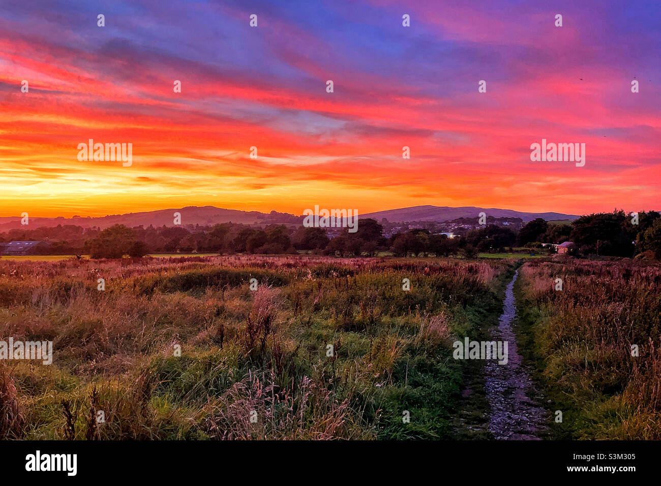 High peak sun set Stock Photo Alamy