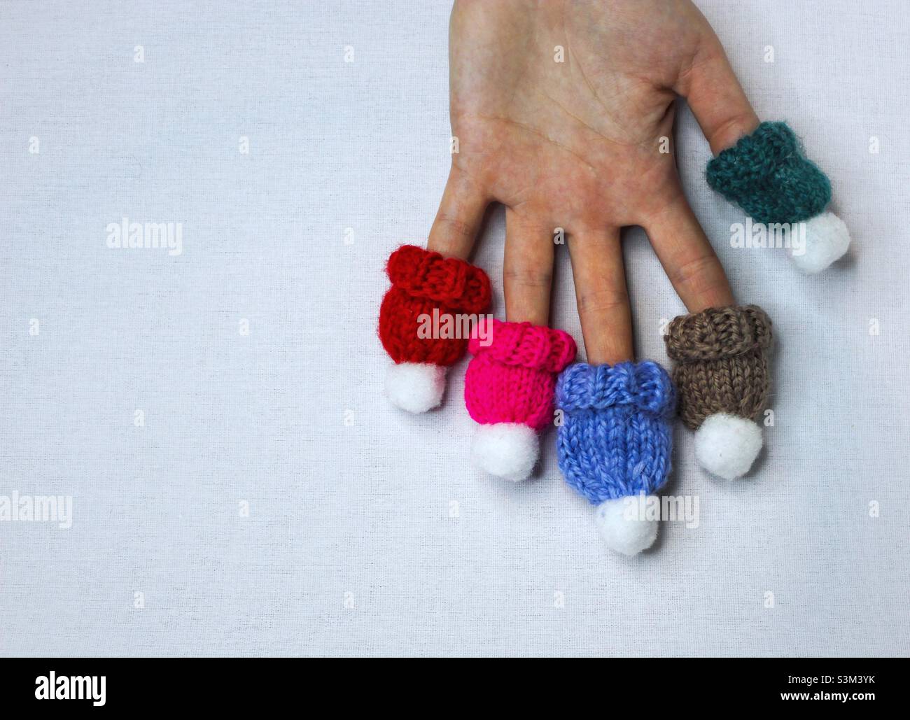 Cute multicolored knitted hats - Smartphone Captured Stock Image