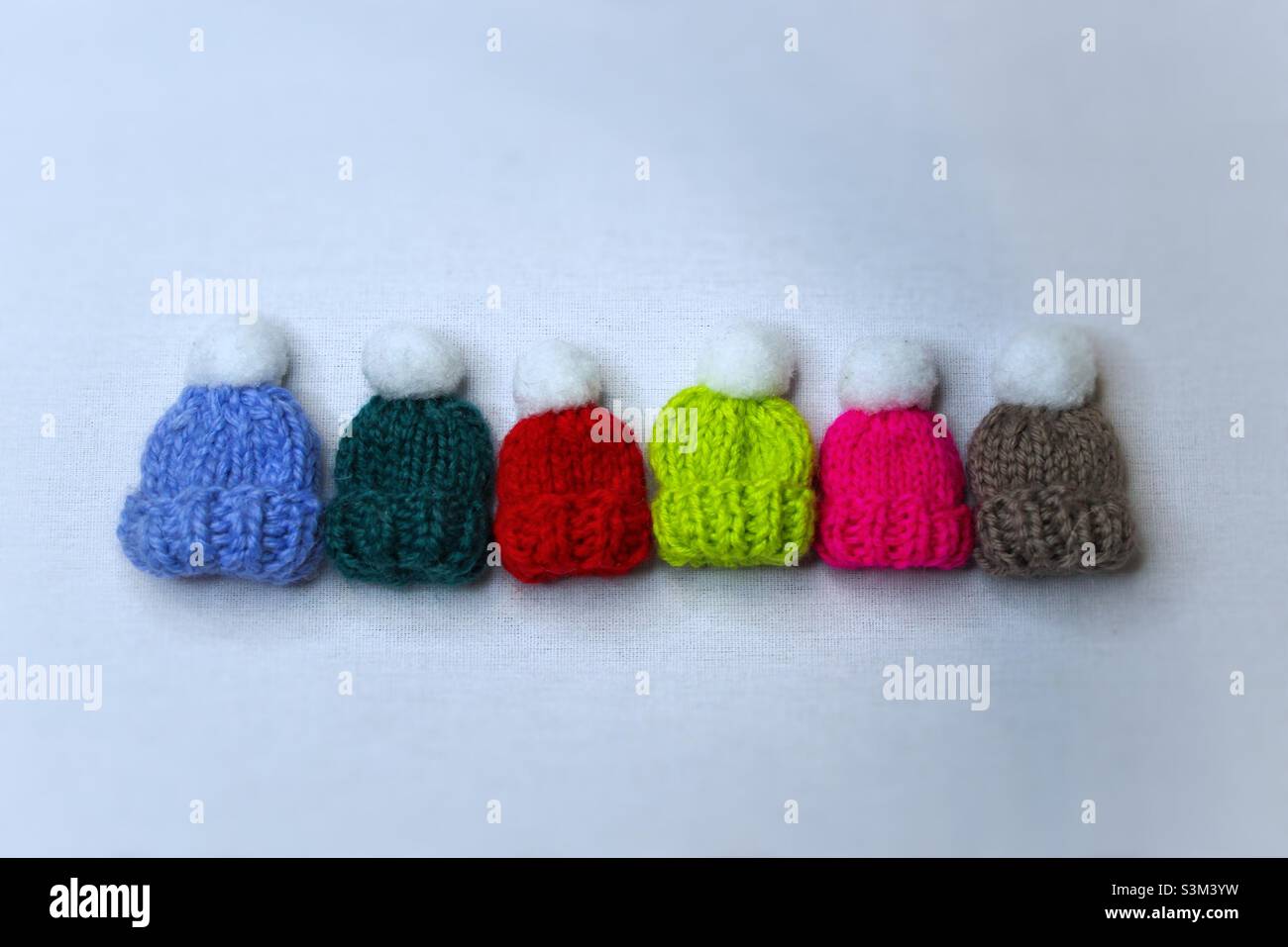 Cute small knitted hats - Smartphone Captured Stock Image