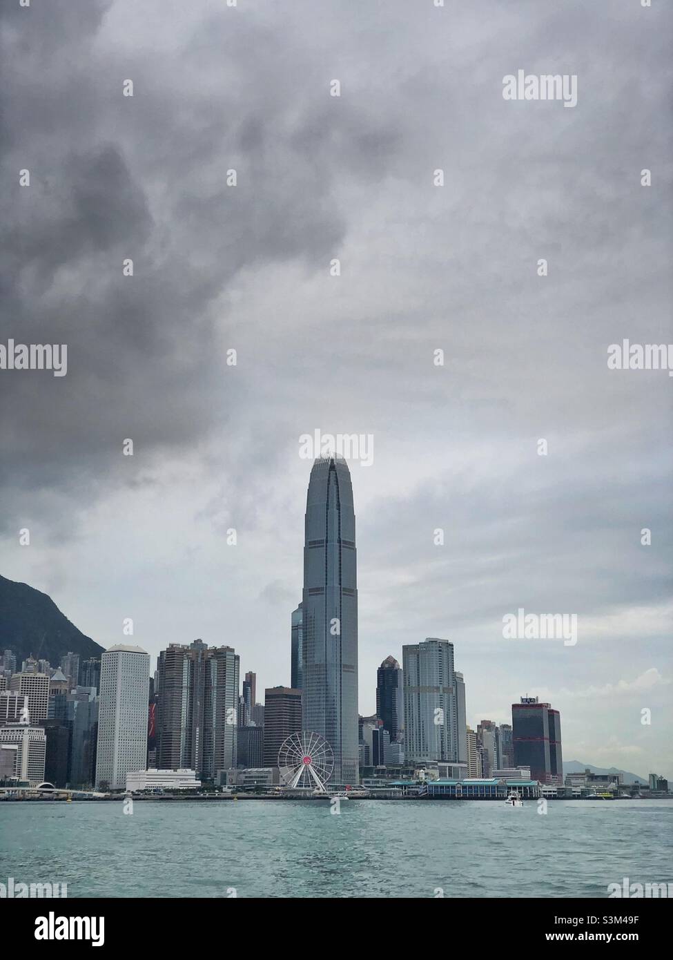 2ifc and the highrise buildings of Central from Victoria Harbour - Smartphone Captured Stock Image