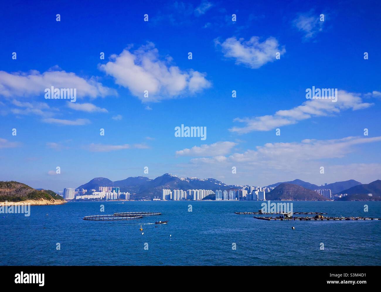 A view of Hong Kong island from Lamma island in Hong Kong. - Smartphone Captured Stock Image