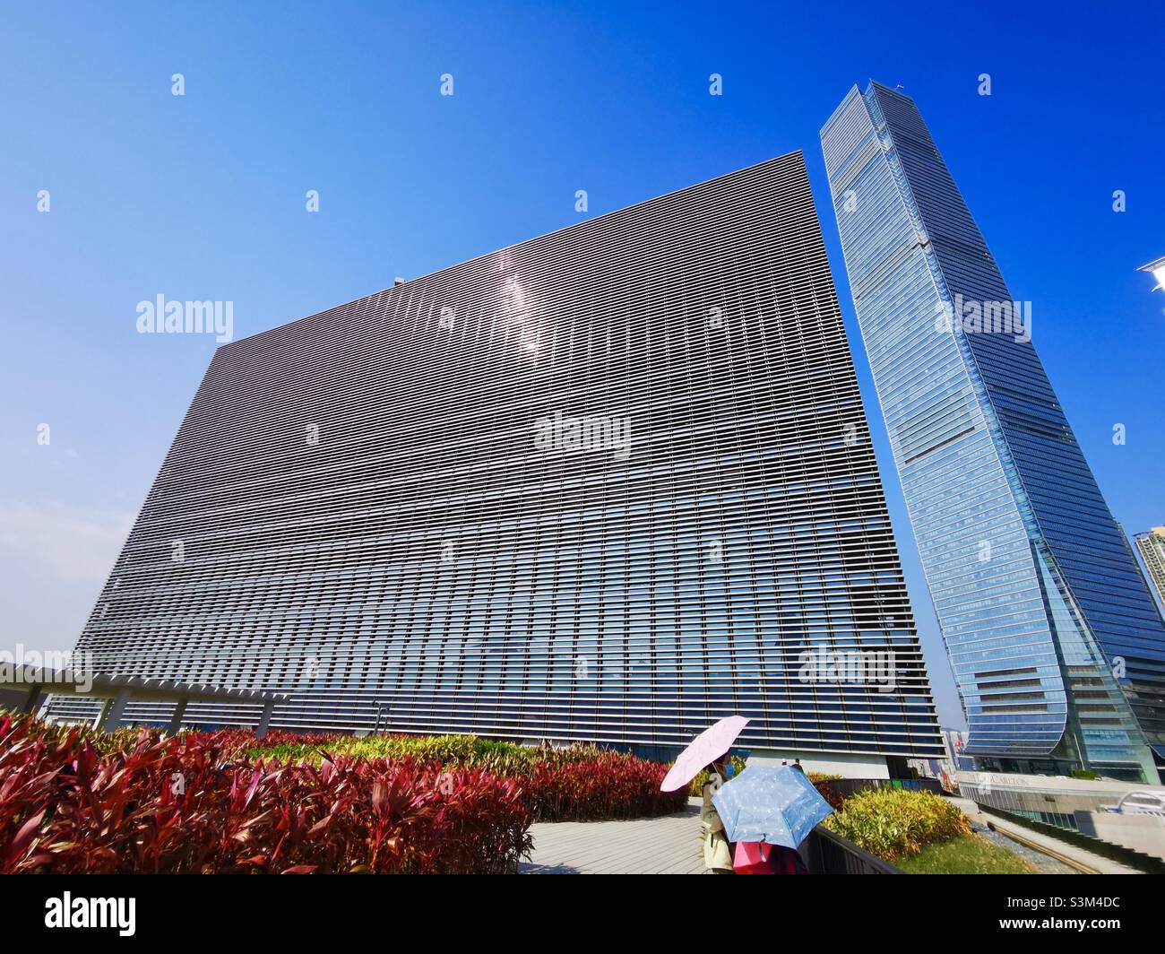 The ICC tower next to the M+ museum in the West Kowloon cultural district in Hong Kong. - Smartphone Captured Stock Image