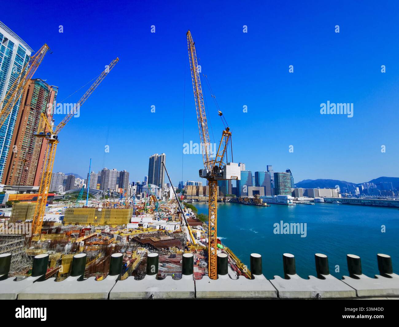 Construction of the expansion waterfront promenade in the West Kowloon Cultural district in Hong Kong. - Smartphone Captured Stock Image