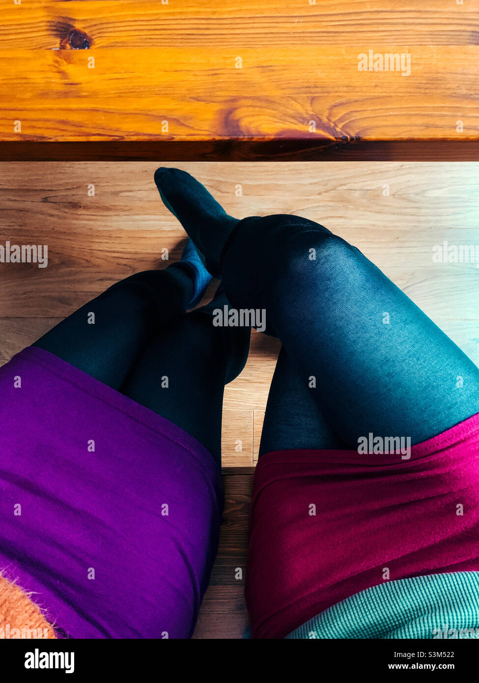 Top down view of a pair of woman’s legs - Smartphone Captured Stock Image