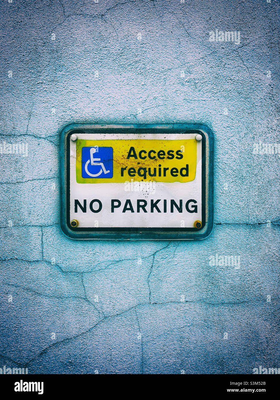 No parking sign on a wall - Smartphone Captured Stock Image