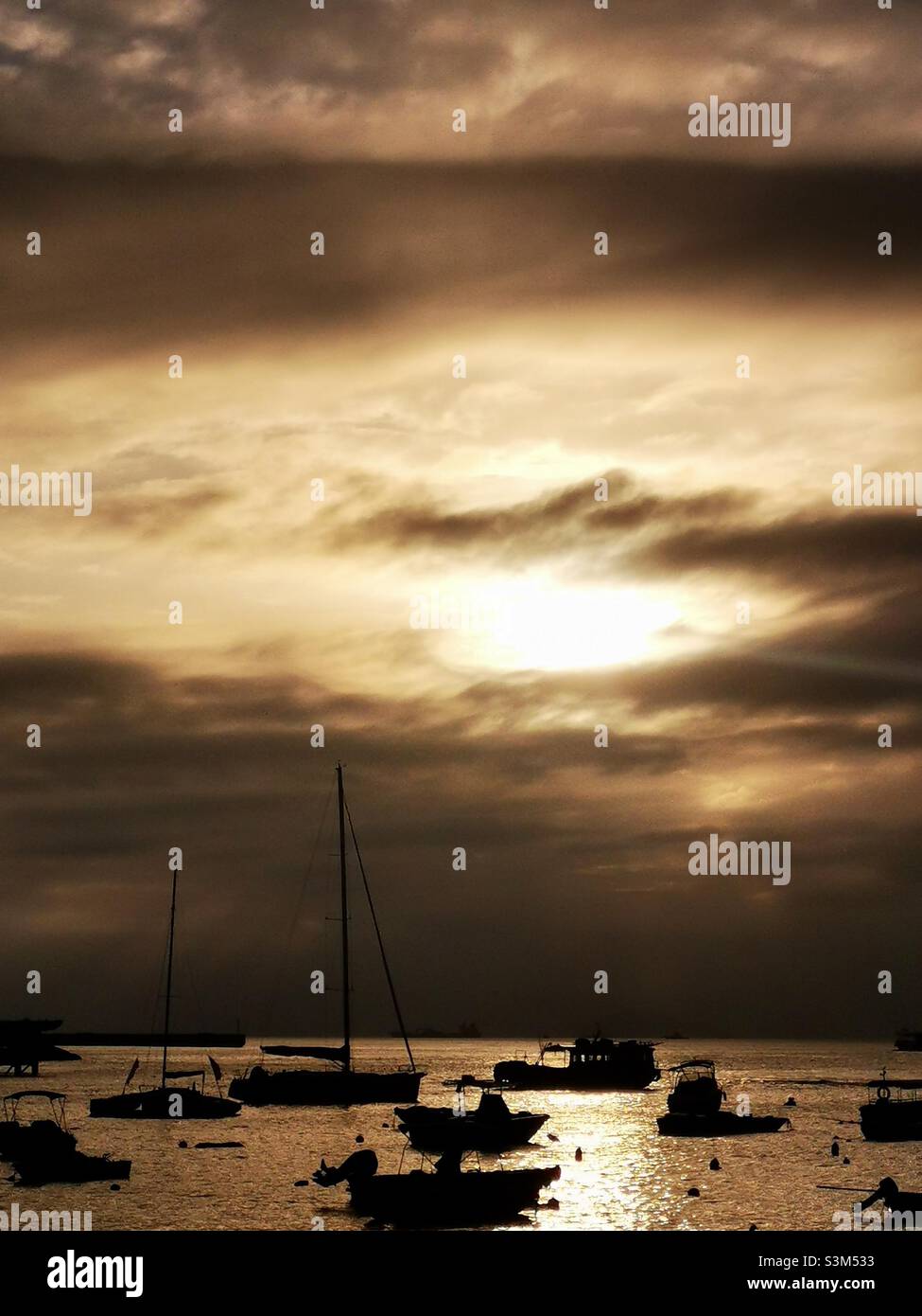A beautiful sunset seen from Lamma island in Hong Kong. - Smartphone Captured Stock Image