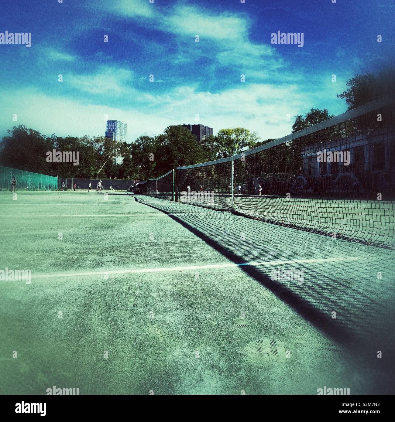 Tennis courts in Central Park. Grunge. - Smartphone Captured Stock Image