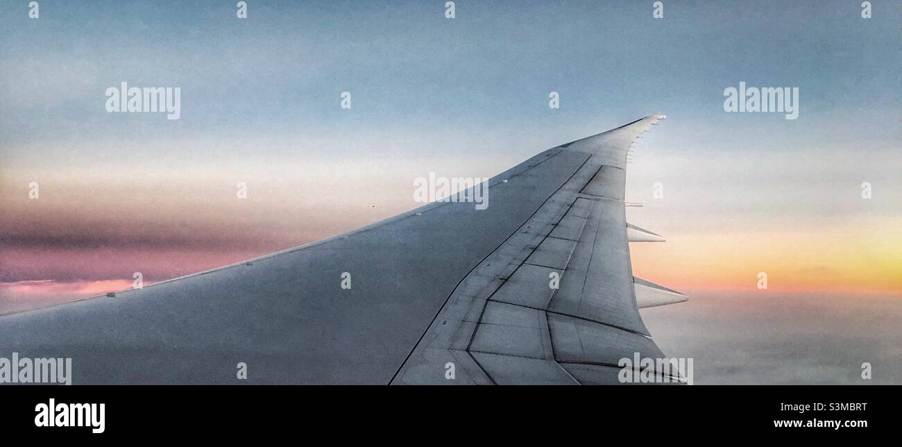 Sunset in flight. - Smartphone Captured Stock Image