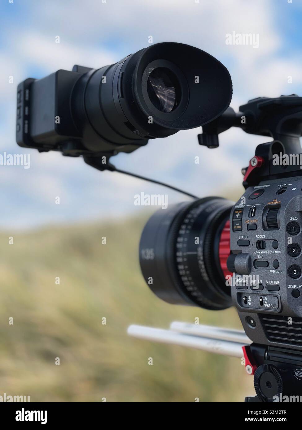 Film camera in the dunes - Smartphone Captured Stock Image