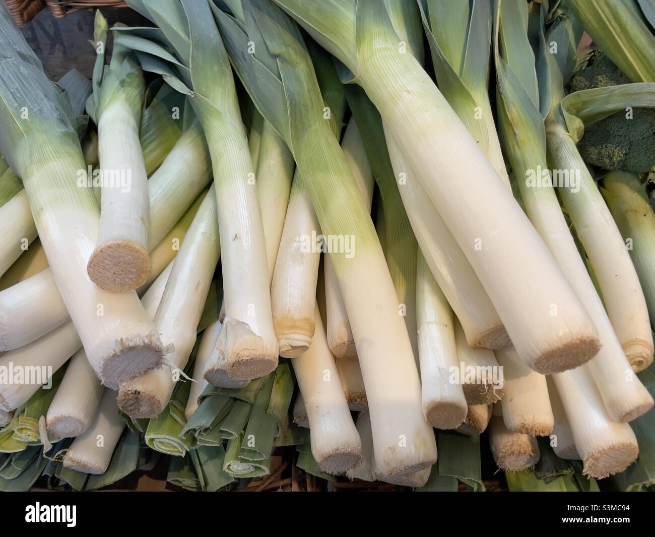 Leeks For sale in the local farm shop, Stock Photo