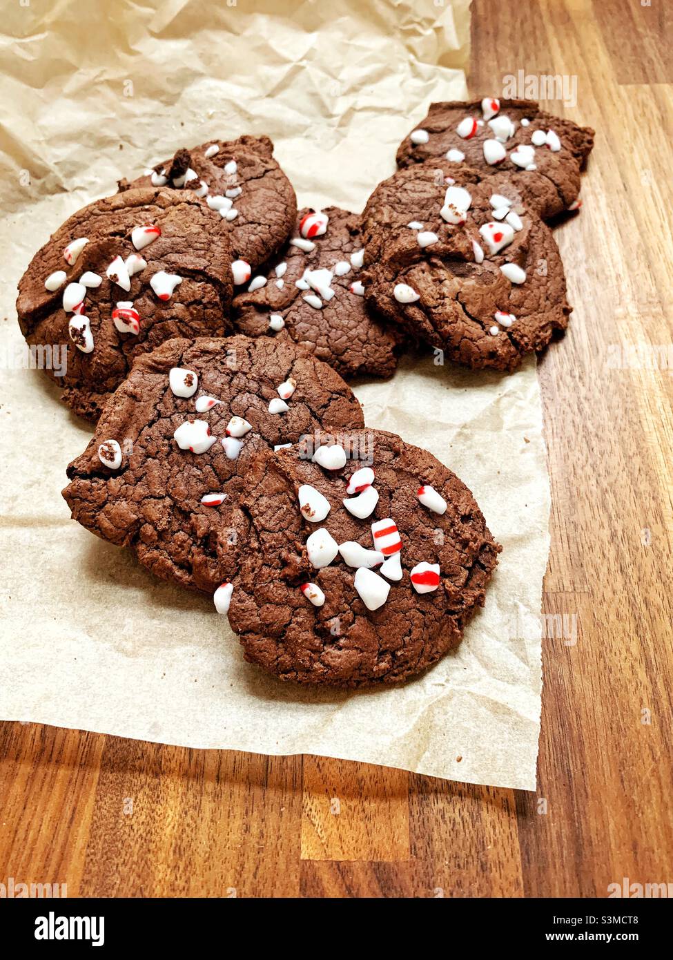 Double fudge home made chocolate cookies with mint candy cane topping - Smartphone Captured Stock Image