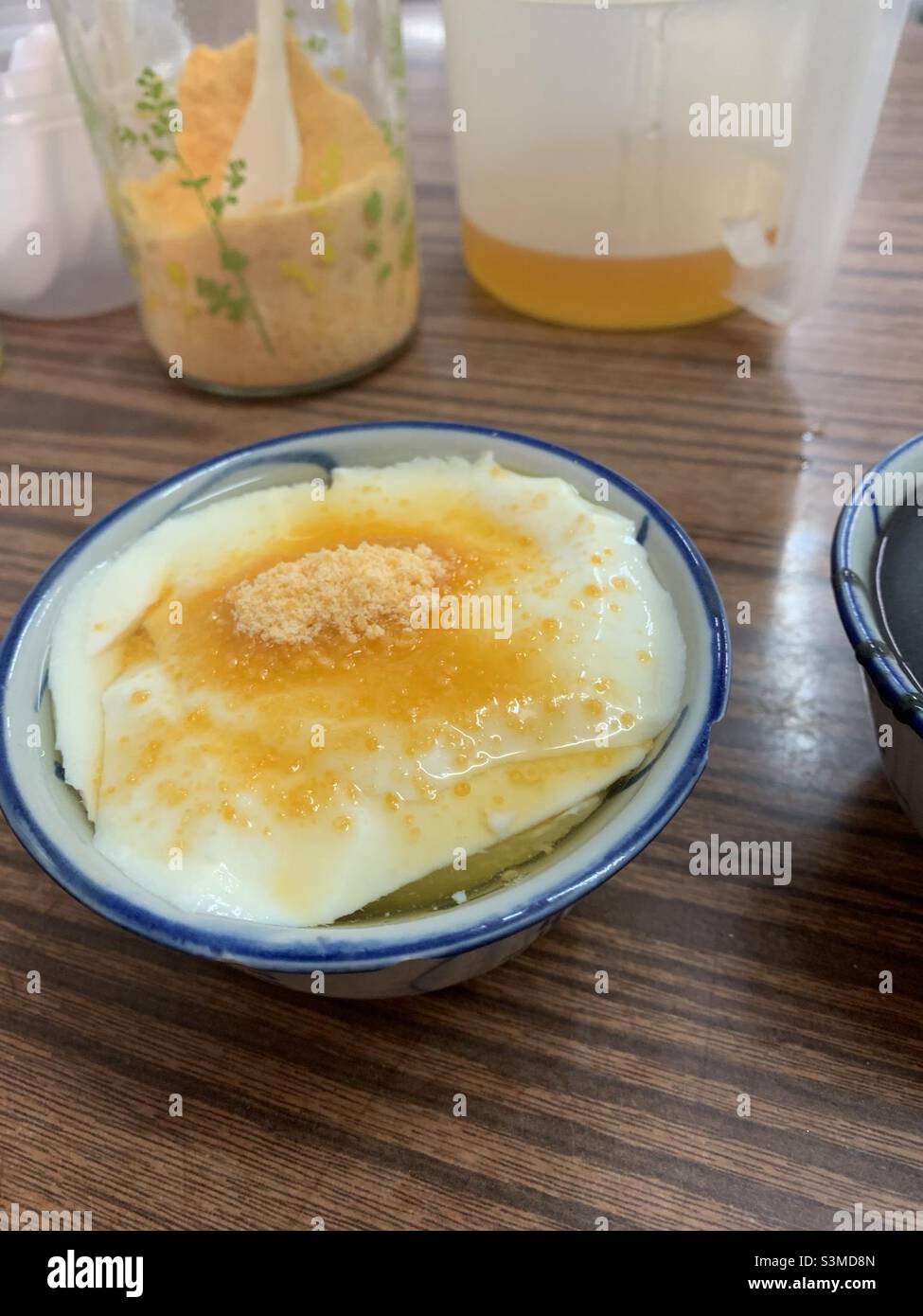 Traditional Tofu pudding in Hong Kong with brown sugar Stock Photo Alamy