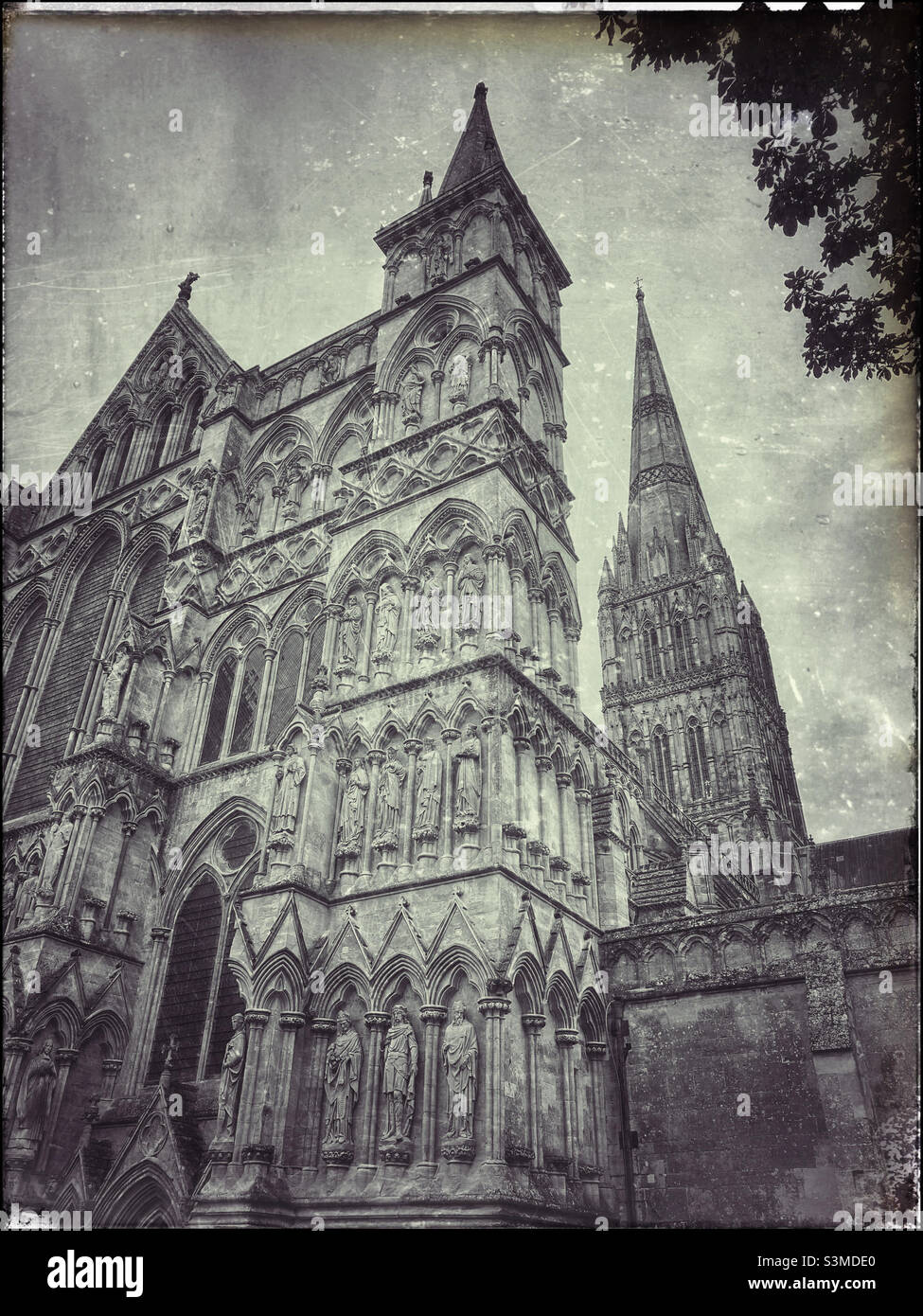 A glass plate retro effect image of the West Face of Salisbury Cathedral. This famous & iconic building has the UK’s tallest spire & houses an original copy of Magna Carta. Photo ©️ COLIN HOSKINS. - Smartphone Captured Stock Image