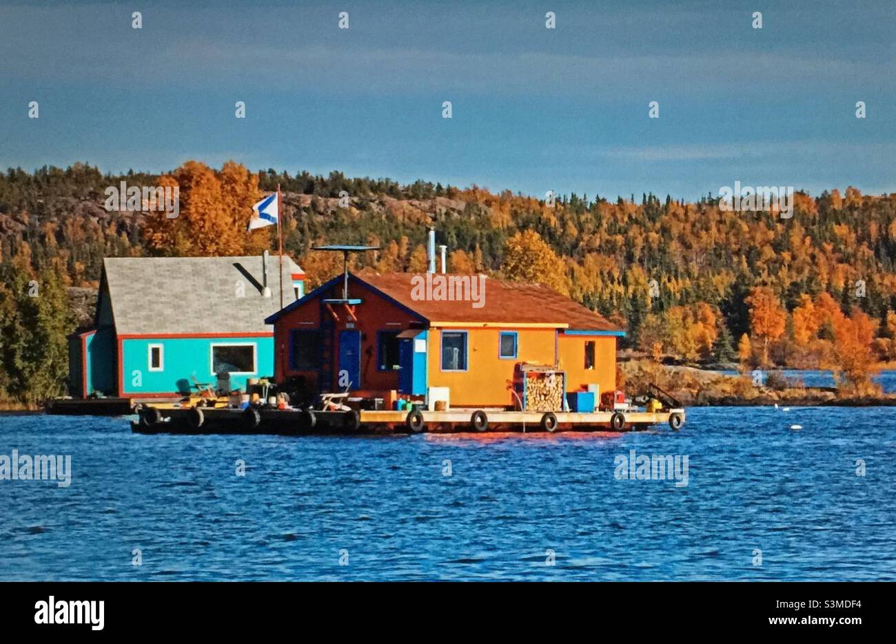 Floating summer cabin, autumn colours, fall, forest, lakeside