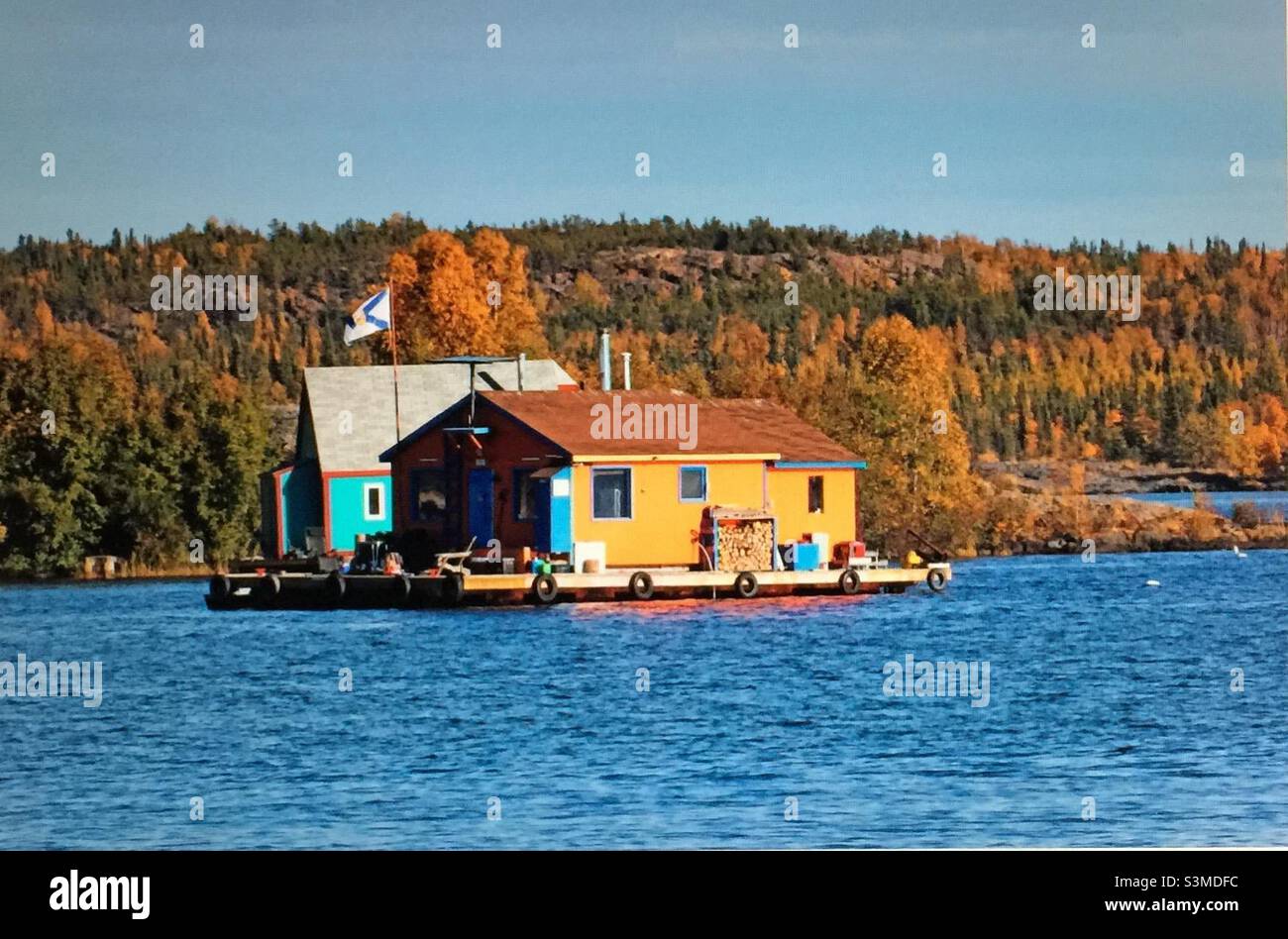 Floating summer cabin, autumn colours, fall, forest, lakeside