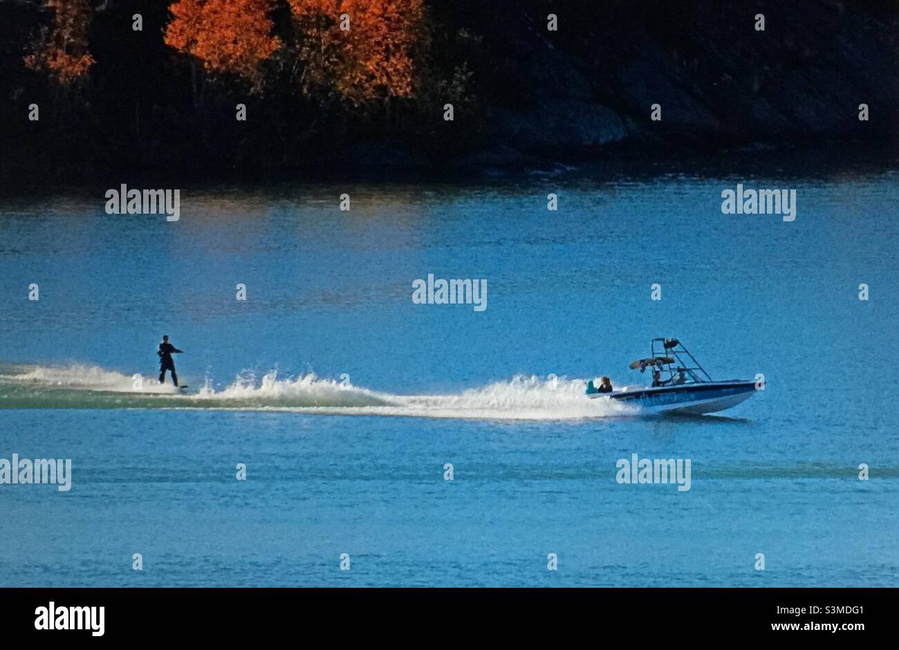 Water skiing, Great Slave Lake, motor boat, white water, speed, sports, power, Yellowknife, Northwest Territories, Canada - Smartphone Captured Stock Image