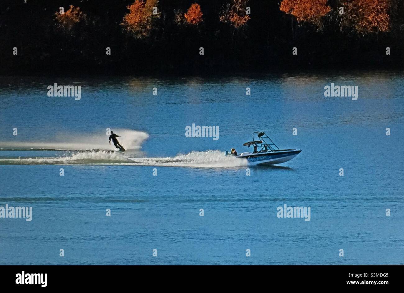 Water skiing, Great Slave Lake, motor boat, white water, speed, sports, power, Yellowknife, Northwest Territories, Canada - Smartphone Captured Stock Image