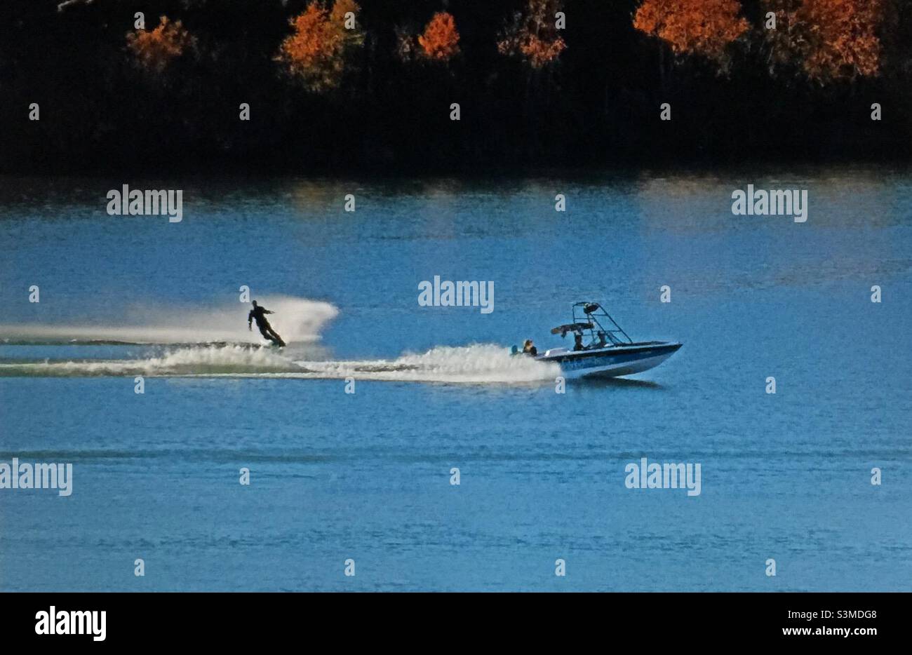 Water skiing, Great Slave Lake, motor boat, white water, speed, sports, power, Yellowknife, Northwest Territories, Canada - Smartphone Captured Stock Image