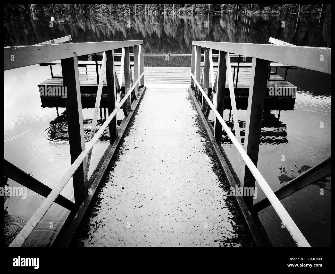 Westwood Lake Fishing Dock with a sprinkle of winter snow Stock Photo