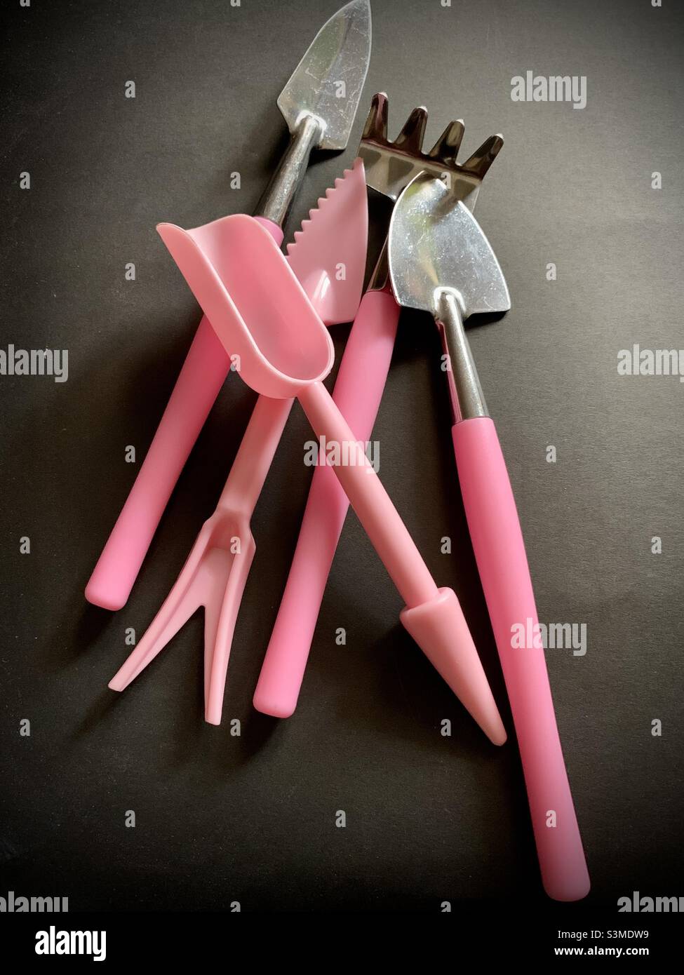 Gardening small or mini tools against black background. - Smartphone Captured Stock Image