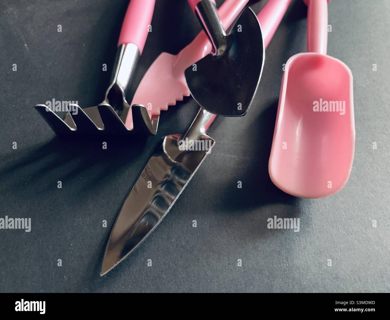 Pink mini or small gardening tools. - Smartphone Captured Stock Image