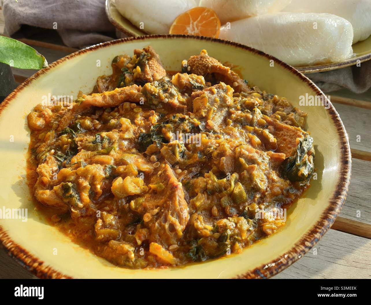 Assorted meat okra and spinach stew, okro stew, okra stew with a side