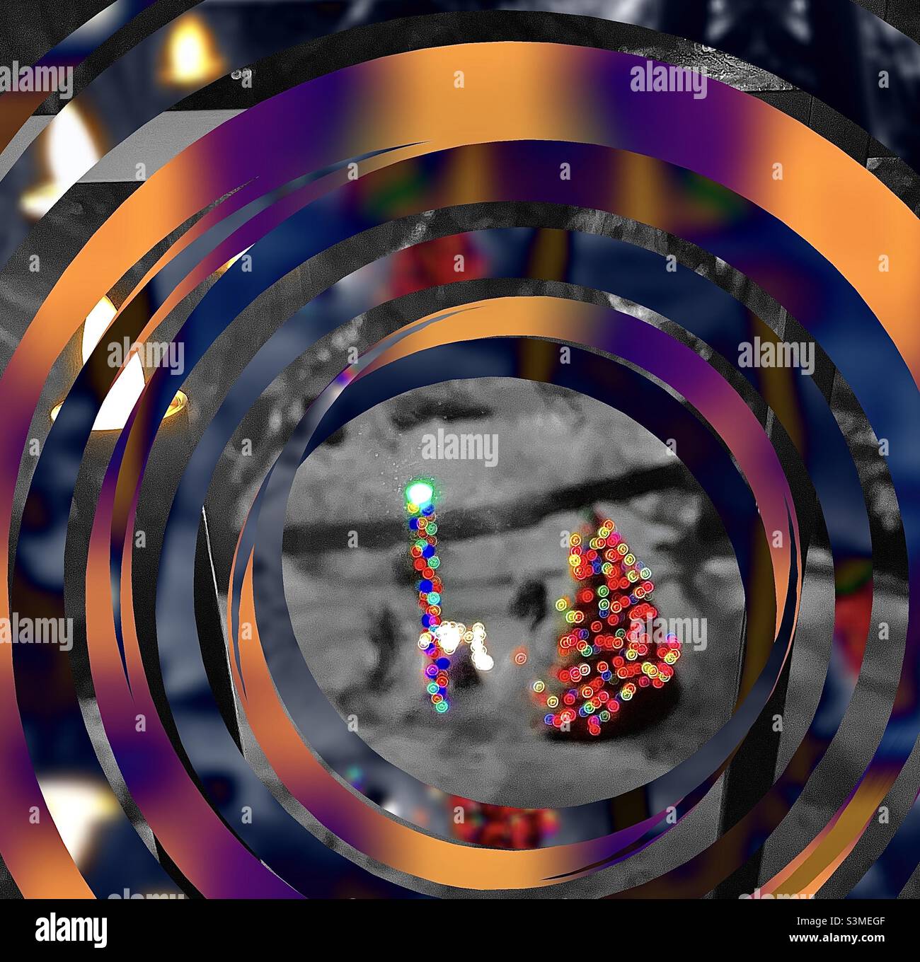 View from a house’s upstairs window in Utah, USA, during the Christmas season, looking out into the decorated front yard at night. The IOS app Fragment was used to create the prismatic frame. - Smartphone Captured Stock Image