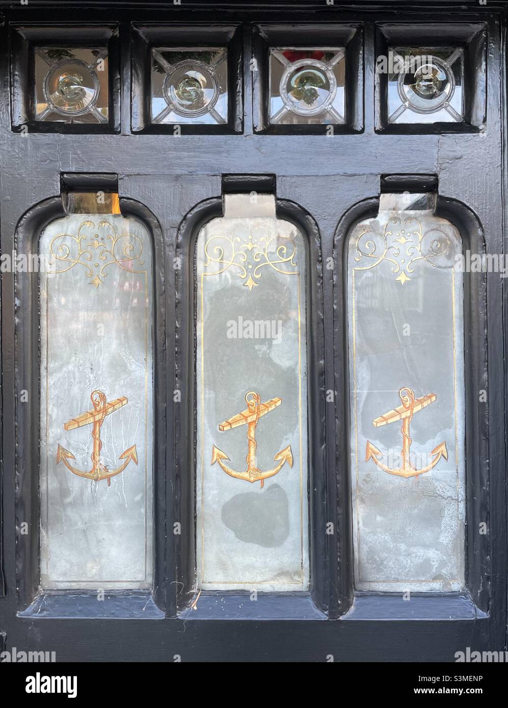 A detail of the front door of an old pub in Upton upon Severn - Smartphone Captured Stock Image