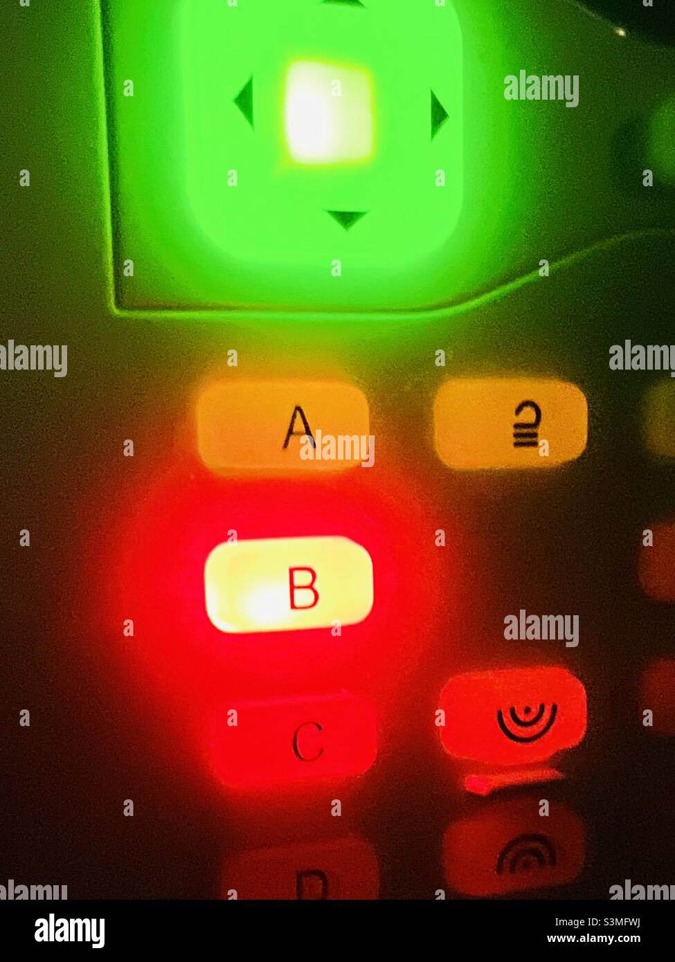 Green orange amber red lights on an alarm system Stock Photo