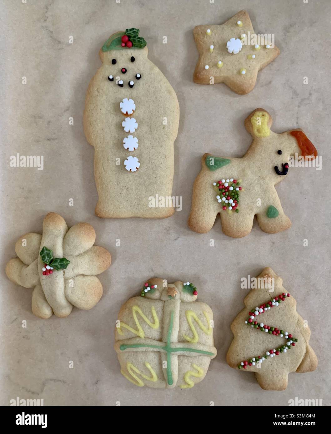 Selection of homemade children’s Christmas biscuits Stock Photo