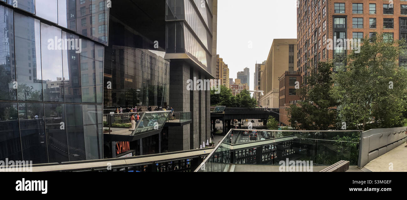 High Line promenade by West 30th Street, Mercado Little Spain food market and restaurant in the modern Hudson Yards neighborhood - Smartphone Captured Stock Image