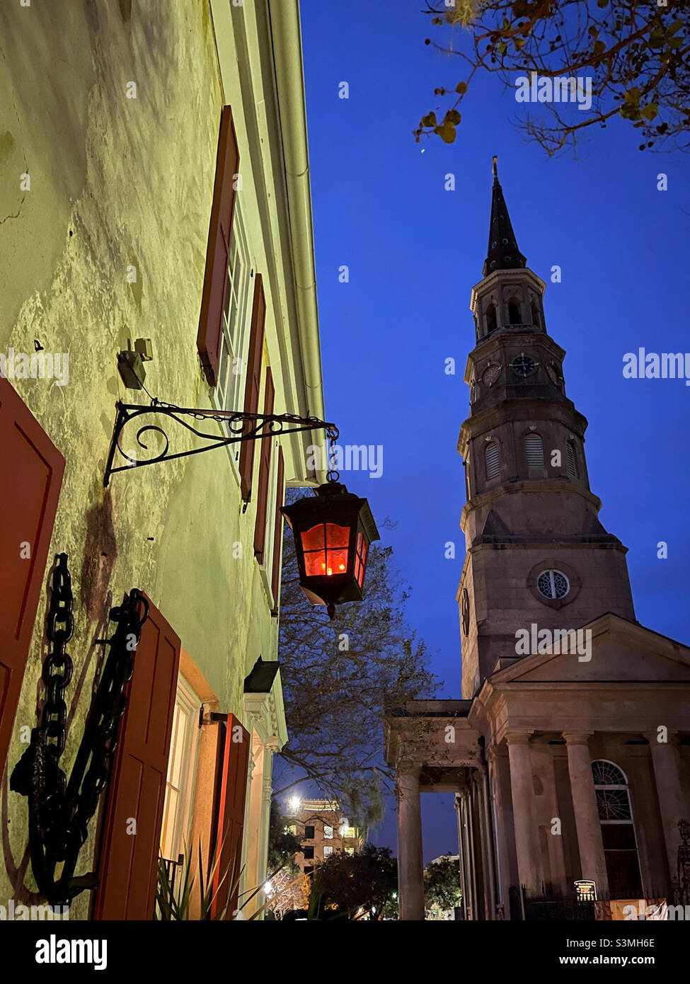 Red lantern hanging near St. Phillip’s Church in Charleston, South Carolina. - Smartphone Captured Stock Image