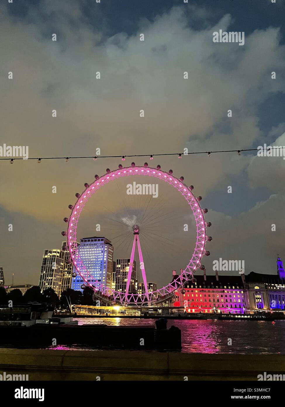 London Eye famous city night lights - Smartphone Captured Stock Image