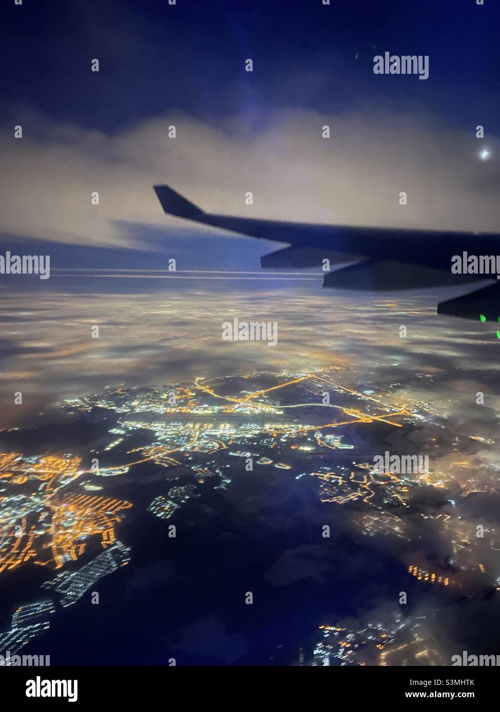 Above Moscow city , View through the window plane on night time Stock Photo
