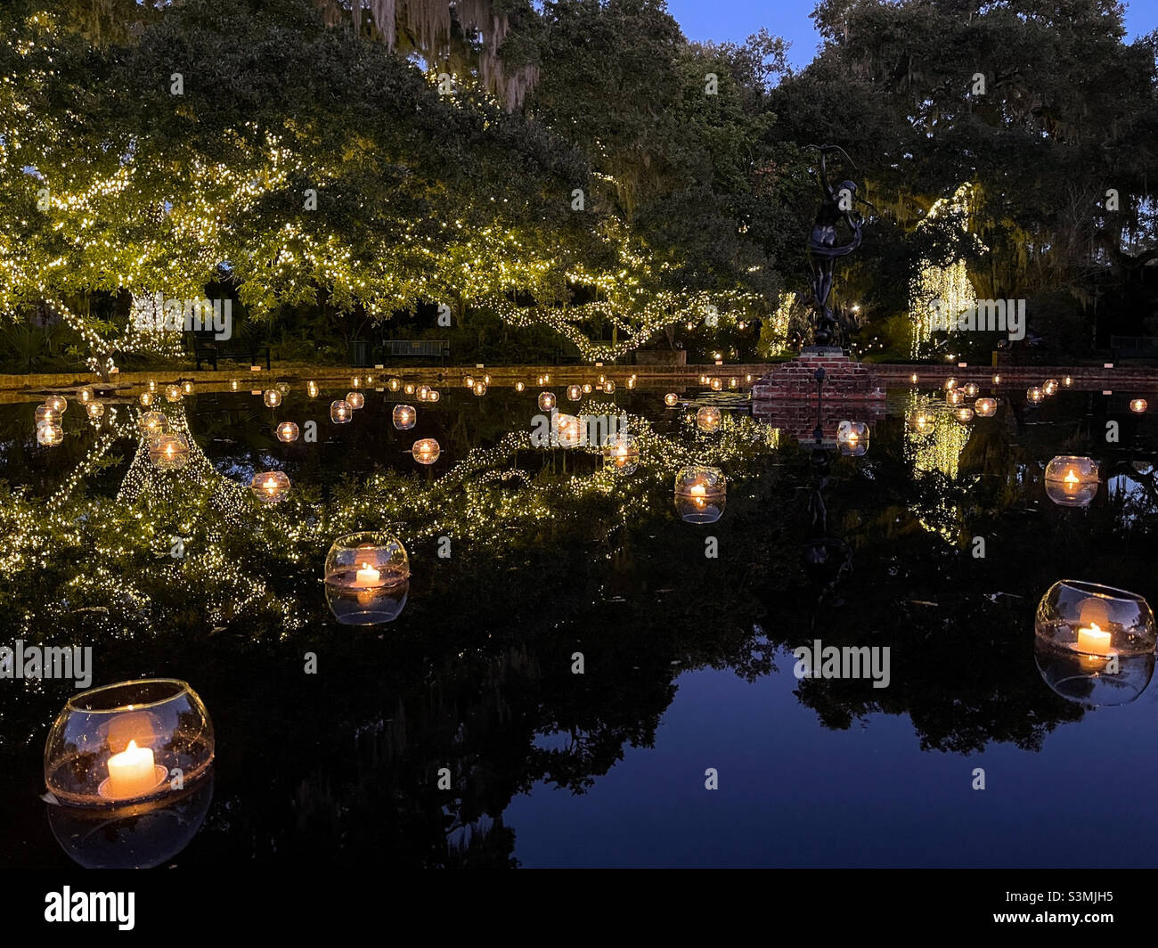 Brookgreen Gardens Nights of a Thousand Candles Oak tree and reflecting pond. Brookgreen Gardens