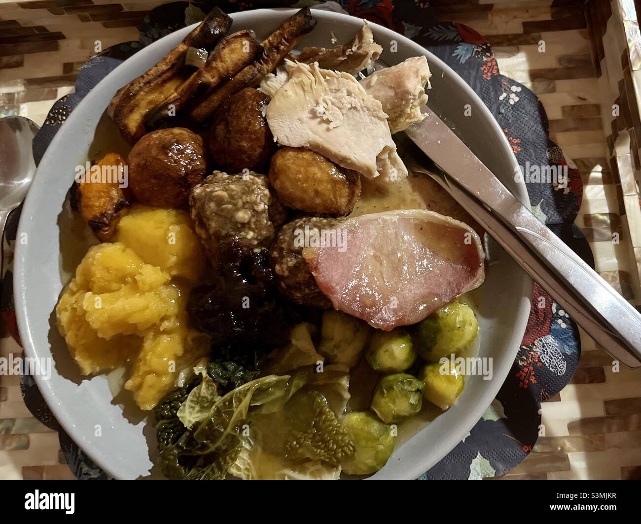 Traditional British Christmas dinner on a mother of pearl tray Stock Photo