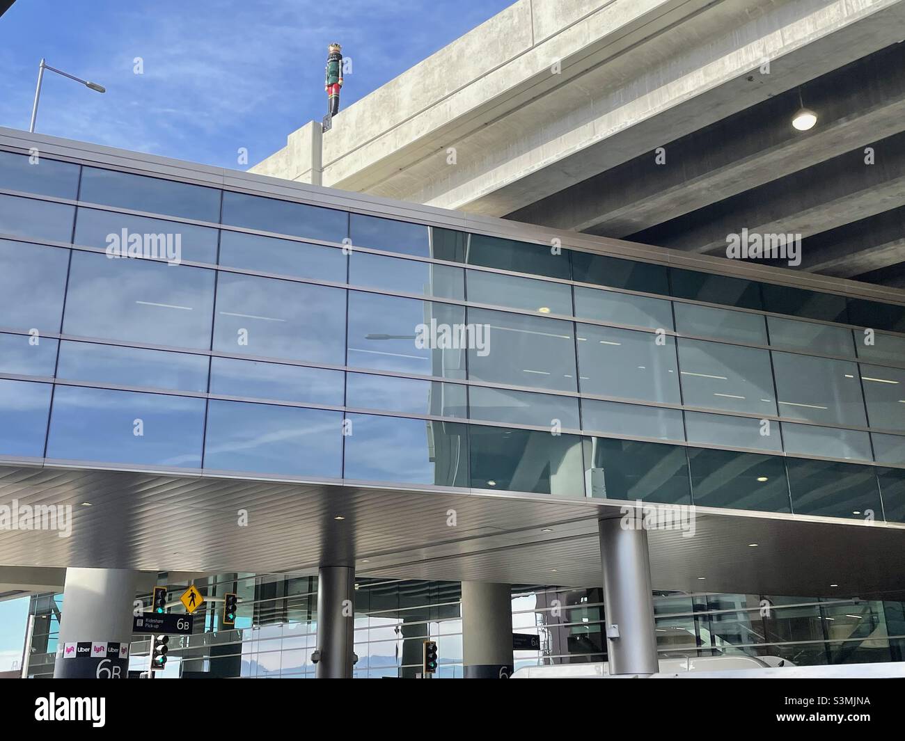 New Salt Lake International Airport recently completed, seen in November 2021 just after Thanksgiving, from the passenger pickup area of the airport. - Smartphone Captured Stock Image