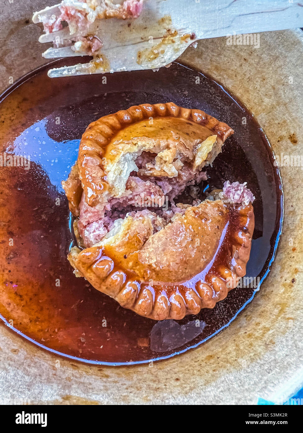 Pork pie and gravy Stock Photo Alamy