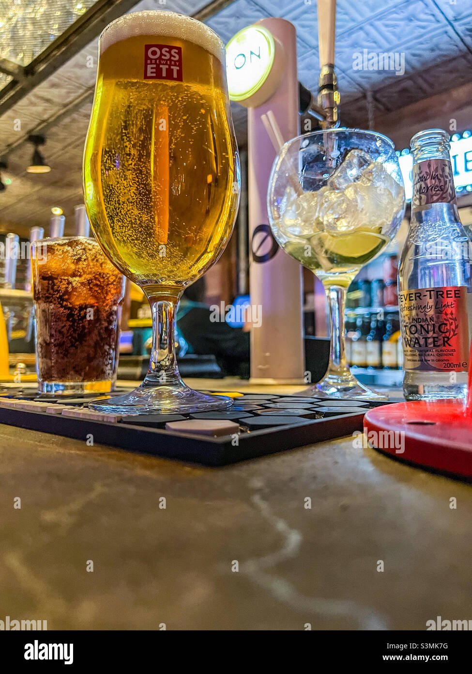 Lager and gin served in a bar - Smartphone Captured Stock Image